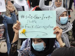 Iraqi students take part in an anti-government protest in the southern city of Basra on February 18, 2020. Since October, the country of 40 million has been rocked by a historically large grassroots movement with big goals: ending corruption, unaccountable sectarian parties and overreach from neighbouring Iran. Hussein FALEH / AFP