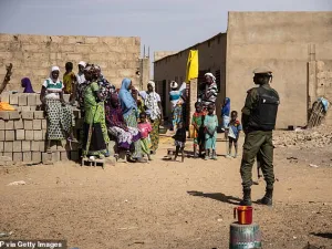 A Burkina Faso soldier patrols at a district that welcomes Internally Displaced People (IDP) from northern Burkina Faso, in Dori on February 3, 2020. (AFP)