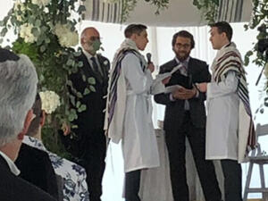 Officiated my first wedding for two Orthodox Jews as an Orthodox rabbi. Times they are a changin.’ (Twitter/@RabbiAvMlotek)