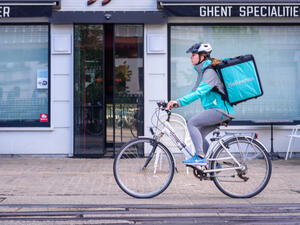 Deliveroo is food delivery company. Couriers transport orders from restaurants to customers. (Shutterstock)