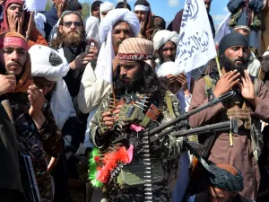Afghan Taliban militants and villagers attend a gathering as they celebrate the peace deal and their victory in the Afghan conflict on US in Afghanistan, in Alingar district of Laghman Province on March 2, 2020. The Taliban said on March 2 they were resuming offensive operations against Afghan security forces, ending the partial truce that preceded the signing of a deal between the insurgents and Washington. NOORULLAH SHIRZADA / AFP