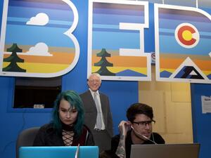 Phone bank volunteers call potential voters from the Colorado campaign office of Democratic presidential candidate Vermont Senator Bernie Sanders on Super Tuesday, March 3, 2020 in Denver, Colorado. Fourteen states and American Samoa are holding presidential primary elections, with over 1400 delegates at stake. Americans vote Tuesday in primaries that play a major role in who will challenge Donald Trump for the presidency, a day after key endorsements dramatically boosted Joe Biden's hopes against surging l