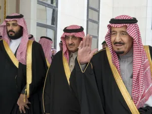 This file handout picture release by Saudi Royal Palace on December 14, 2016 shows Saudi King Salman bin Abdulaziz (R), Crown Prince Mohammed bin Nayef (C) and deputy Crown Prince Mohammed bin Salman arriving for the opening session of the Shura Council in Riyadh. AFP