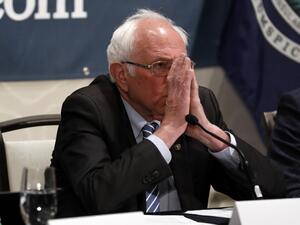 n this file photo taken on March 9, 2020 Democratic presidential hopeful Bernie Sanders speaks at a Coronavirus Public Health Roundtable at the Westin Detroit Metropolitan Airport in Romulus, Michigan. Sanders cancelled a campaign rally for first time over COVID-19, coronavirus, fears on March 10, 2020. JEFF KOWALSKY / AFP