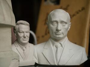 Busts of Russian President Vladimir Putin and the country's first president Boris Yeltsin are seen on sale in Moscow on March 11, 2020. Supporters celebrated and critics called for protests on March 11 as the prospect sunk in of Russian President Vladimir Putin staying in power until 2036. Lawmakers in the lower house State Duma voted on March 11 to give final approval to a package of constitutional amendments introduced by Putin -- including a last-minute addition to "reset" his presidential terms. Dimitar