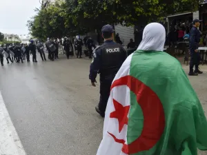 Algerian riot police gather during an anti-government demonstration in the capital Algiers on March 14, 2020. RYAD KRAMDI / AFP