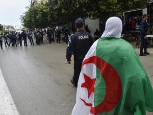 Algerian riot police gather during an anti-government demonstration in the capital Algiers on March 14, 2020. RYAD KRAMDI / AFP