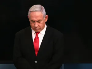Israeli Prime Minister Benjamin Netanyahu arrives for a speech at his Jerusalem office on March 14, 2020, regarding the new measures that will be taken to fight the Corona virus in Israel. Netanyahu said Israel would shut down eateries, shopping centres and gyms in a bid to halt the spread of coronavirus. AFP/File