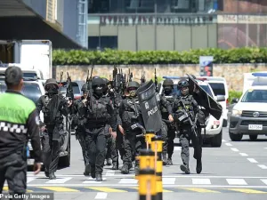 The ex-guard shot a fellow guard, who is now in hospital in stable condition, and has taken 30 people including mall vendors hostage inside the building. (AFP/File)