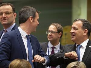 European health chiefs greeted each other with elbow bumps at an emergency meeting being held in Brussels today. Pictured, Croatian Health Minister Vili Beros, right, bumps elbows to say hello to French Health Minister Olivier Veran (Dailymail)