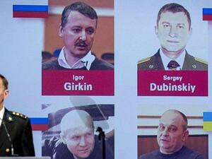 Four men are accused of helping move into Ukraine a Russian missile that shot down Malaysia Airlines Flight 17