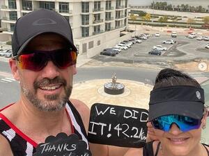 South African couple who ran a marathon on the balcony of their Dubai apartment (Twitter)