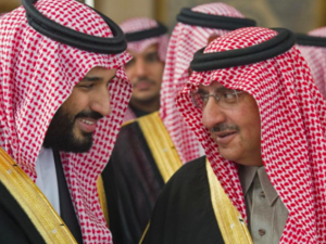 Mohammed bin Nayef, right, had been first in line for the throne until 2017, when Mohammed bin Salman, left, was elevated over him (AFP)