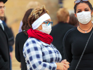 Israel Women visiting Jerusalem’s nearly deserted after Israel imposed some of the world's tightest restrictions to contain COVID-19 coronavirus disease AFP/File