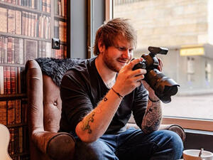 Three bottles of the sauce were signed by Ed himself