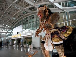 This general view shows an empty departures area of the international terminal at Ngurah Rai International Airport near Denpasar on Indonesia's resort island of Bali on March 27, 2020, as the tourist numbers drop due to the worldwide COVID-19 coronavirus outbreak. SONNY TUMBELAKA / AFP