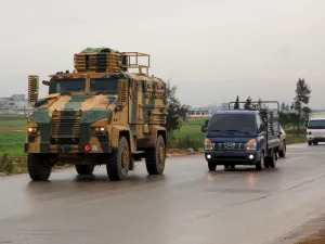 A Turkish military convoy drives on a highway linking Idlib to the Syrian Bab al-Hawa border crossing with Turkey on March 31, 2020. Mohammed AL-RIFAI / AFP