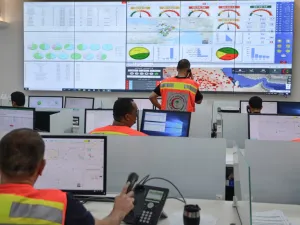 Employees of the COVID-19 coronavirus disease operations room of the Saudi Red Crescent (SRC) are seen while on duty in the Saudi capital Riyadh, on April 6, 2020. The SRC increased their employees to meet the increased demand on ambulances since the novel coronavirus appeared and the kingdom imposed a curfew. FAYEZ NURELDINE / AFP