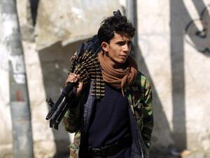 In this file photo taken on November 09, 2019, a Shiite Huthi rebel fighter stands guard during a gathering to celebrate the birth of Islam's Prophet Mohammed in the Yemeni capital Sanaa. AFP/File