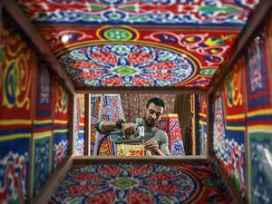 A Palestinian craftsman fashions a traditional "fanous" lantern, a decoration used to celebrate the start of the Muslim holy month of Ramadan beginning later in the week, in a workshop in Khan Yunis in the southern Gaza Strip. From cancelled iftar (fast breaking) feasts to suspended mosque prayers, Muslims across the Middle East are bracing for a bleak month of Ramadan fasting as the threat of the COVID-19 pandemic lingers. The holy Muslims fasting month of Ramadan is a period for both self-reflection and s