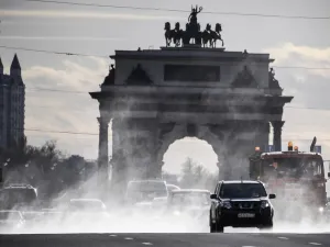 Municipal vehicles clean and disinfect a street in downtown Moscow on April 23, 2020, during the COVID-19 outbreak, caused by the novel coronavirus. Alexander NEMENOV / AFP
