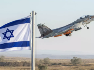 An Israeli Air Force F-15 Eagle fighter plane performs at an air show during the graduation of new cadet pilots at Hatzerim base in the Negev desert, on June 29, 2017. Jack Guez, AFP