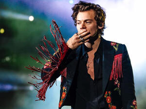 The t-shirts are white and have the phrase, "Stay Home. Stay Safe. 