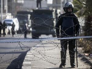 Illustrative photo of Egyptian riot police stand guard in Cairo, January 28, 2014. (AFP/Mahmoud Khaled)