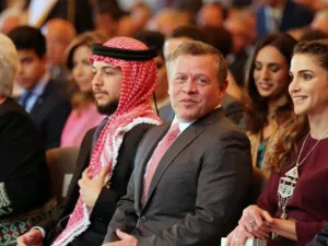 Jordan's Princess Muna, Crown Prince Hussein, King Abdullah II and Queen Rania attend a ceremony held in Amman on May 25, 2016, to mark the desert kingdom's 70th Independence Day. (AFP/Khalil Mazraawi)