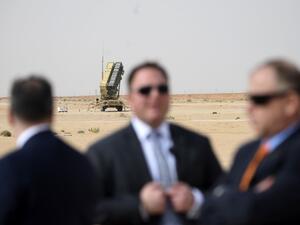 n this file photo taken on February 20, 2020 Security for US Secretary of State Mike Pompeo (L) is pictured near a Patriot missile battery as he visits the Prince Sultan air base in Al-Kharj, in central Saudi Arabia. The US is pulling out four of its powerful Patriot missile systems from Saudi Arabia, after determining the threat from Iran that sparked an arms buildup in the region last year had waned, a Defense Department official said May 7, 2020. ANDREW CABALLERO-REYNOLDS / AFP