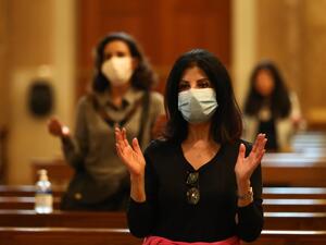 Christian worshippers maintain social distancing as they attend a Sunday mass following the reopening of Saint George Maronite Church in the Lebanese capital Beirut amid the ongoing COVID-19 pandemic, on May 10, 2020. ANWAR AMRO / AFP