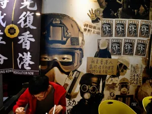 A man eats lunch at the Aegis, a restaurant started by a Hong Kong lawyer which helps Hongkongers who have left the city, in Taipei on May 27, 2020. (AFP)