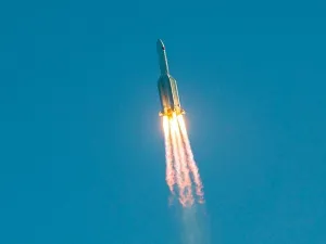 The Long March 5B rocket is pictured taking off from the the Wenchang launch site on China's southern Hainan island on May 5. It spent a few days in orbit before splashing down off West Africa (AFP)