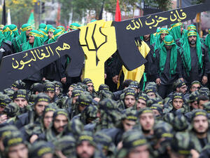 Members of Lebanon’s Shiite movement Hezbollah take part in Ashura commemorations in a southern Beirut suburb. Anwar Amro/AFP via Getty Images