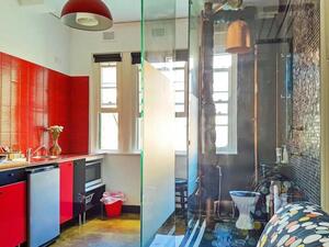 A studio apartment listed in Sydney, Australia, is drawing attention online for the unusual placement of the bathroom -- in the kitchen (UPI/Domain.com.au)