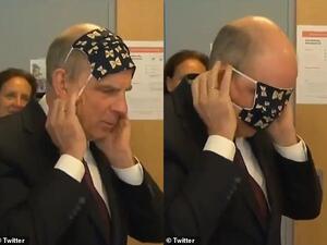 Koen Geens (pictured) was visiting a sewing shop in Wijgmaal, Belgium, where volunteers had made 35,000 fabric masks to help the country's coronavirus efforts. (Twitter)