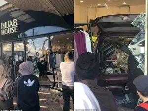 In footage of the incident, the driver of the SUV ploughed into another, smaller car, before driving directly into the shopfront. (Twitter)