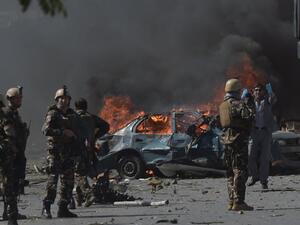 Afghan security forces personnel are seen at the site of a car bomb attack in Kabul on May 31, 2017. Shah Marai / AFP