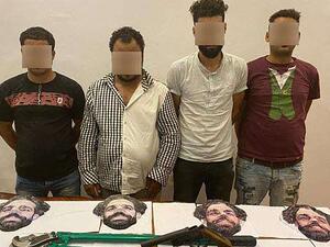  Four men have been arrested in Cairo after using the Liverpool forward's face as a disguise to rob stores (Photo: Goal.com)