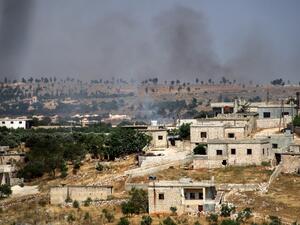 This picture taken on June 4, 2020 shows smoke plumes rising following shelling by pro-Syrian government forces in the town of Banin, north of Maaret al-Numan in Syria's northwestern Idlib province. Abdulaziz KETAZ / AFP