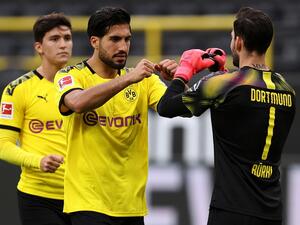 رومان بوركي (يمين) وإيمري تشان يحتفلان بفوز دورتموند على هيرتا برلين