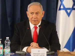 Israeli Prime Minister Benjamin Netanyahu chairs the weekly cabinet meeting in Jerusalem on June 7, 2020. Netanyahu urged world powers to reimpose tough sanctions against Iran, vowing to curb Tehran's regional "aggression" hours after another deadly strike on pro-Iranian fighters in Syria. Menahem KAHANA / AFP