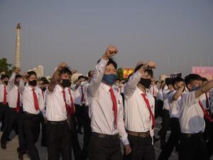 North Korean students take part in a rally denouncing 'defectors from the North' as they march from the Pyongyang Youth Park Open-Air Theatre to Kim Il Sung Square in Pyongyang on June 8, 2020. North Korea on June 6 threatened to close a liaison office with the South as officials seethe over anti-Pyongyang leaflets sent across the border, saying further steps were also in the pipeline to make Seoul "suffer". The warning is the second in two days of possible retaliation over Seoul's failure to stop North Kor