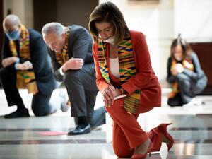 Speaker of the House Nancy Pelosi (D-CA) and other Democratic lawmakers take a knee to observe a moment of silence on Capitol Hill for George Floyd and other victims of police brutality June 8, 2020, in Washington, DC. Democrats kneeled in silence in the US Congress on Monday as they observed an eight minute, 46 second tribute to George Floyd and other black Americans "who have unjustly lost their lives." House Speaker Nancy Pelosi and Senate minority leader Chuck Schumer were joined by two dozen lawmakers 