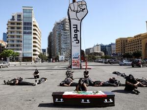 Lebanese anti-government protesters take part in a symbolic funeral for the country in the downtown area of the capital Beirut, on June 13, 2020, on the third consecutive day of demonstrations due to a deepening economic crisis. ANWAR AMRO / AFP
