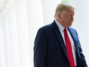 US President Donald Trump arrives for the event where he will sign an executive order on police reform, in the Rose Garden of the White House in Washington, DC, June 16, 2020. SAUL LOEB / AFP