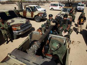 Members of the self-proclaimed eastern Libyan National Army (LNA) special forces gather in the city of Benghazi, on their way to reportedly back up fellow LNA fighters on the frontline west of the city of Sirte, facing forces loyal to the UN-recognised Government of National Accord (GNA), on June 18, 2020. The resurgent GNA has vowed to push on for Sirte, late Libyan leader Moamer Kadhafi's hometown and the last major settlement before the traditional boundary between western Libya and Haftar's stronghold i