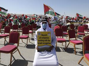 Palestinians participate in a big rally to protest against Israel's plan to annex parts of the occupied West Bank, in Jericho on June 22, 2020. Israel intends to annex West Bank settlements and the Jordan Valley, as proposed by US President Donald Trump, with initial steps slated to begin from July 1. ABBAS MOMANI / AFP