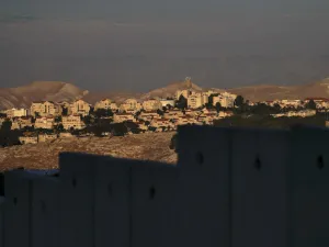 A picture taken from east Jerusalem behind Israel's controversial separation barrier shows the Israeli settlement of Maale Adumim in the occupied West Bank on June 22, 2020. AHMAD GHARABLI / AFP