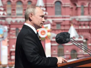 Russian President Vladimir Putin gives a speech during a military parade, which marks the 75th anniversary of the Soviet victory over Nazi Germany in World War Two, at Red Square in Moscow on June 24, 2020. The parade, usually held on May 9, was postponed this year because of the coronavirus pandemic. Alexey NIKOLSKY / SPUTNIK / AFP